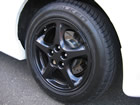 Final result showing perfectly refurbished wheel on vehicle